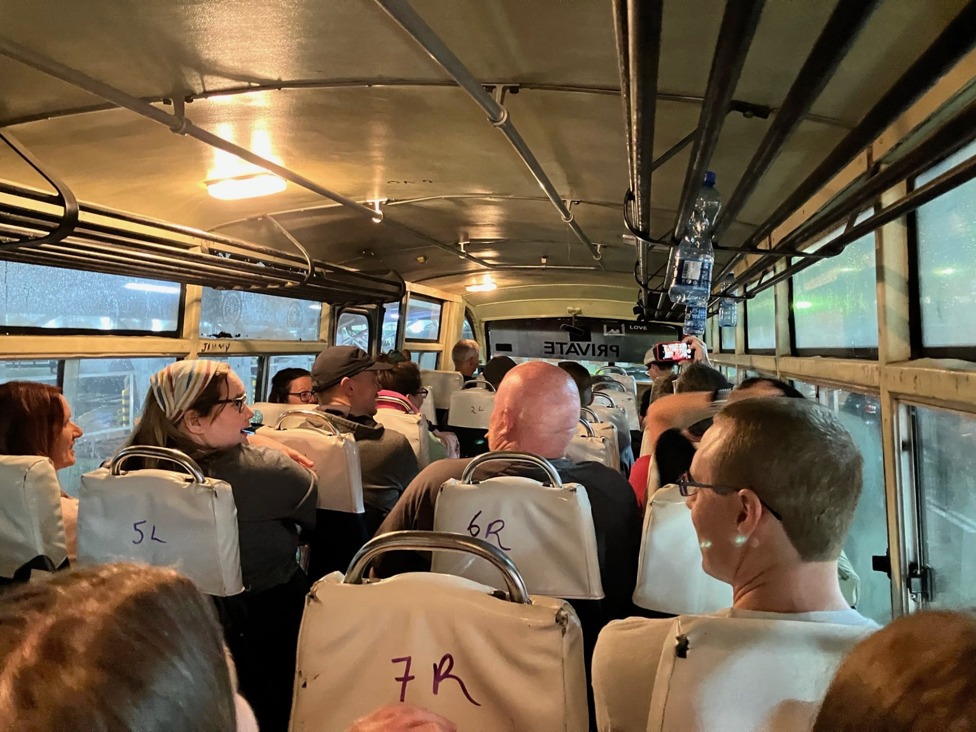 The team riding a bus through Nairobi traffic
